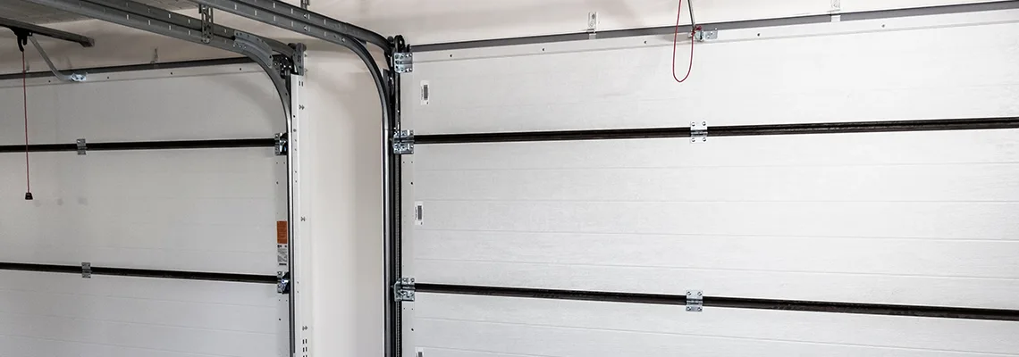 Fix Folding Garage Door Jerking in Weston